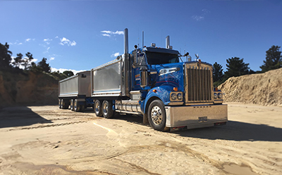 Kenworth T909 from Paragalli Haulage Canberra and NSW
